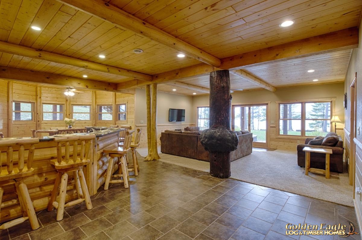 log beam round ceiling beam 8" 8 inch rafter pillar golden eagle log & timber homes log home mart wisconsin rapids pine beam decorative structural rafter log rafters kiln-dried pine