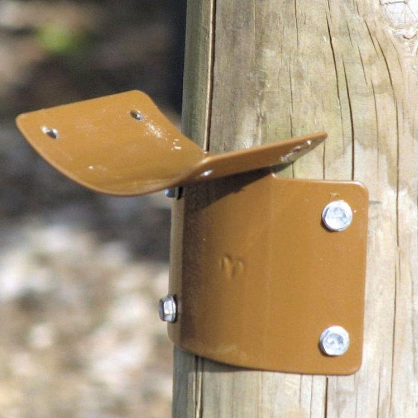 A brown metal post bracket attached to a wooden fence post, designed for securing railing or fencing.