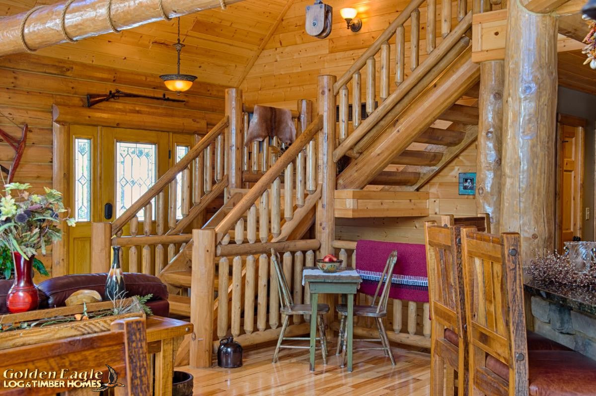 round long rustic log timber tree like tie beam beams rafter rafters ceiling great room loft pine golden eagle log home mart tod sharon jay sarah zachary zack zak zac zach parmeter beam beam beam beam beam log beam round beam tree beam
