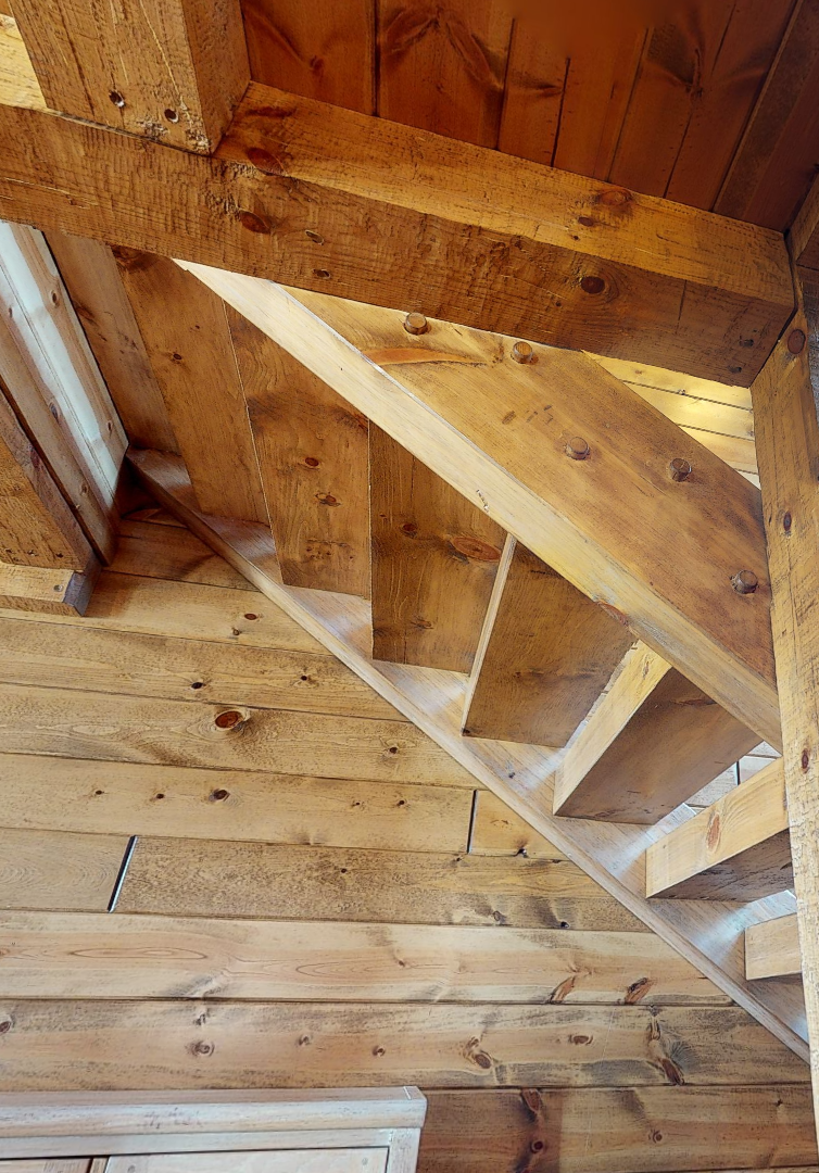 golden eagle log and timber homes log home mart parmeter square timber stairs treads stringers hand hewn smooth wisconsin rapids Golden Eagle Log & Timber Homes Stairs Steps Stairway Timber stairs square rectangular rectangle stairs stair system stairway steps rustic log home mart zach zachary parmeter 