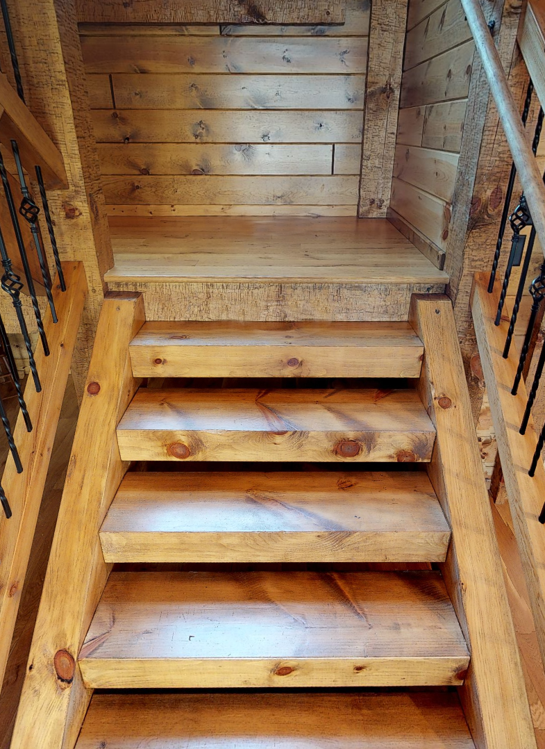 golden eagle log and timber homes log home mart parmeter square timber stairs treads stringers hand hewn smooth wisconsin rapids Golden Eagle Log & Timber Homes Stairs Steps Stairway Timber stairs square rectangular rectangle stairs stair system stairway steps rustic log home mart zach zachary parmeter 